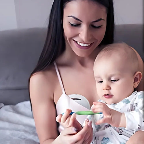 maman bébé joue tire lait electrique