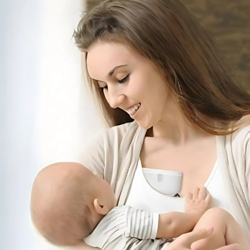 femme bébé tire lait joie